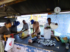 The fish market section does brisk business during the morning hours