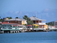 Colorful cottages line Jolly Beach Harbor