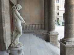 A graceful marble statue looks forlorn; Plaza de San Francisco