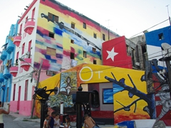 Becky snapping a shot of "Salvador’s Alley” which is a brightly hued Santeria religious area