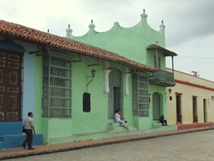 The green, two story building houses the "Estudio Galeria Jover", a fantastic art gallery; Plaza San Juan de Dios