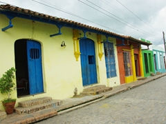 Colorful buildings line the 18th Century square of Plaza del Carmen