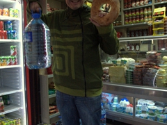 George proudly showing off his massive simit (donut shaped bread) and 10L of water