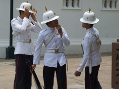 Soldiers from the Royal Guard get ready for a changing of the guard; Grand Palace