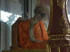 Mummified monk, Loung Pordaeng, who died while meditating in the 1980s. His body is on display at Wat Khunaram; Ko Samui