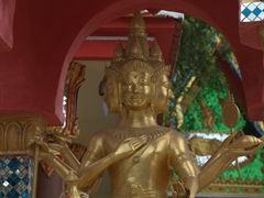 A golden multi-headed statue at the base of Big Buddha Temple; Ko Samui