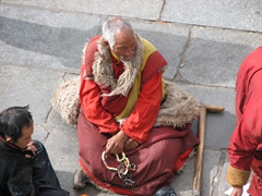 We saw this monk sitting in the same spot during the entire Lamp Festival