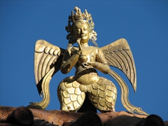 Detail of a golden figurine; Norbulingka