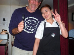 Vic Cooper posing next to one of our friendly waitresses; Polar Star