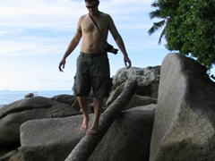 Robby navigating his way across the Beau Vallon beach boulders
