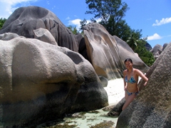 Becky strikes a pose against one of Anse Source d’Argent’s many boulders
