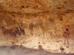 Interesting Jabbaren cave painting where worshippers in a row carry gifts for a deity
