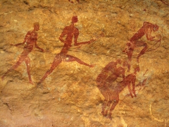 Hunting scene (the lower right figures appear to position themselves to mount or move something); Jabbaren
