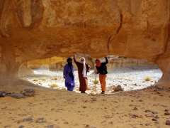 Abdallah, Achmed, and Becky pose in an arch formation in Jabbaren
