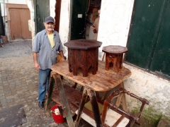 A friendly wood craftsman in the Casbah who had his son give us a private tour of the winding alleyways of his city; Algiers

