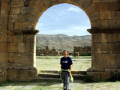 Becky standing in an archway; Djemila
