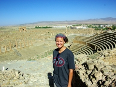 Becky reveling at the sight of Timgad's amphitheater
