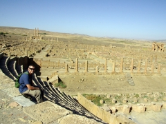 Robby enjoying the vista from Timgad's top row in the amphitheater
