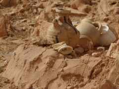 Pottery is often placed on a burial site to distinguish each grave site from another

