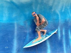 Robby with his best surf pose; Tubes Bar and Restaurant in Kuta