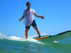 Anh Long picks up surfing right away; Nusa Dua 