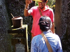 Dewa giving Chi Xuan a blessing before entering Gunung Kawi rock temple