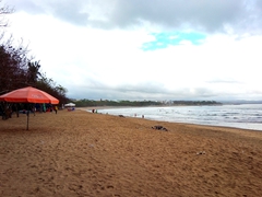 Kuta beach is deserted after an early morning rain storm