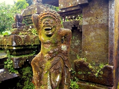 Moss covered statue; Batukaru temple