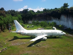 A limestone quarry is the final resting place of an abandoned 737 plane; near Pandawa Beach