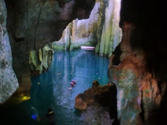 Descending into the main chamber of Sawa-i-Lau cave