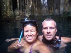 Getting ready to dive through a short underwater passage to another cave system; Sawa-i-Lau Cave