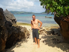 Robby striking a pose between the limestone formations of Sawa-i-Lau island