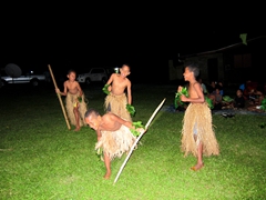 The boys laughing during their performance; Wiwi Village Meke