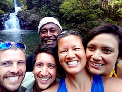 Smiling before leaving the second waterfall - everyone loved the Lavena Coastal adventure!