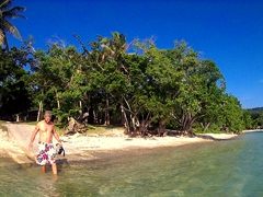 Robby getting ready to snorkel at Havannah Beach (more commonly known as "Survivor Beach" since the reality TV show was filmed here)