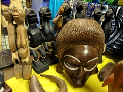 A wide assortment of wood carvings on display