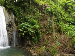 The main waterfall and plunge pool of Waterfall Village's upper falls