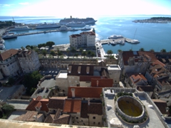 View overlooking Split's harbor. Notice the vestibule (building with a hole in its roof) which once served as the entrance to the residential section of Diocletian Palace