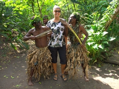 Becky smiles as she gets "attacked" by villagers showcasing their cannibal history - the missionaries who converted Vanuatu were brave (foolhardy) men!