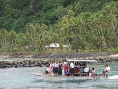 This boat is only authorized to transport 8 people but it is dangerously overcrowded. We held our breath as it made the slow journey to Aunuu Island
