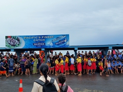 School children waiting for a ride home; Apia bus station