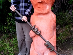 Robby next to a Maori statue; Medlands Beach