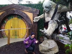 Becky getting stomped by a troll outside Weta Cave