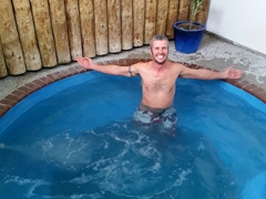 Robby soaking in a hot pool at Holdens Bay Holiday Park; Rotorua