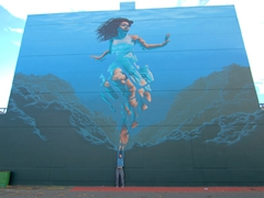 Robby by the massive "Pania of the Reef" mural. (According to Maori legend, Pania is the protector of the reef, and she lives off the coast of Napier) 