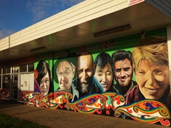 Mural portraits in the town center; Kaikohe
