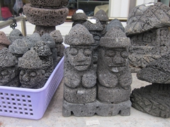 Basalt souvenirs for sale (over 90% of Jeju's surface is basalt so this is a common souvenir); Yongduam Rock
