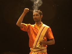 Detail of one of the priests performing the nighly aarti ritual