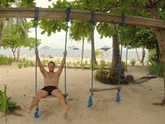 Robby on the swing set; Evolution Dive Center
