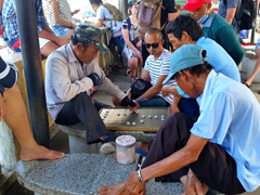 Locals passing time at Nha Trang's port
